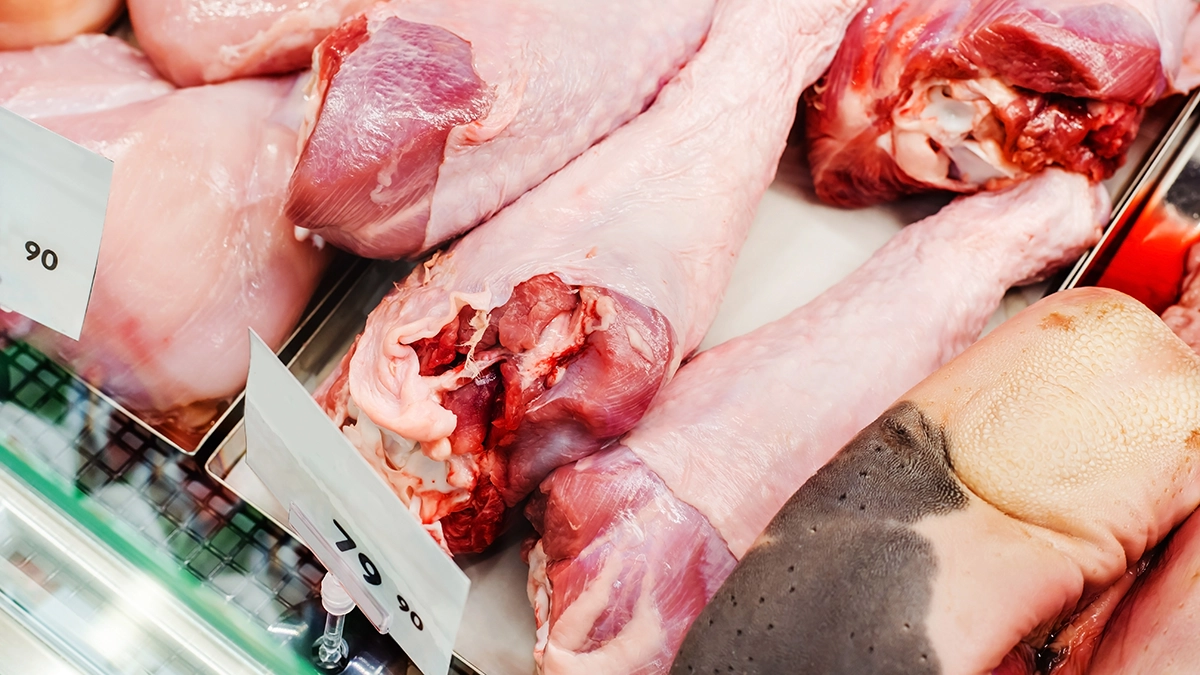 a group of raw turkey legs